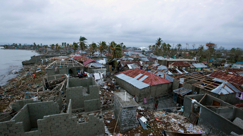 Homes lay in ruins after the passing of Hurricane Matthew in Les Cayes, Haiti, Thursday, Oct. 6, 2016. Two days after the storm rampaged across the country’s remote southwestern peninsula, authorities and aid workers still lack a clear picture of what they fear is the country’s biggest disaster in years. (Image: AP)